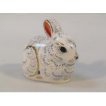 A Royal Crown Derby paperweight, Bunny, blue with gilt highlights, printed marks beneath, gilt