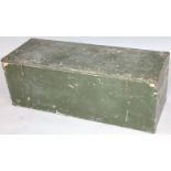 An early 20thC wooden ammunition trunk, with a rectangular outline and metal clasps hinging to