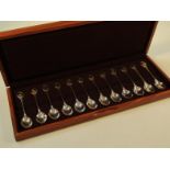 An RSPB cased silver spoon collection, by John Pinches Ltd, with paperwork in fitted case, 5cm high,