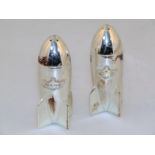 A silver plated Craig Field rocket design two piece cruet set, comprising pepper pot and salt pot,