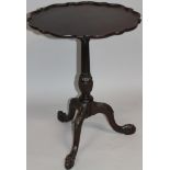 An early 20thC mahogany Chippendale revival tripod table, the shaped top with a piecrust outline