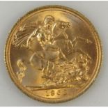 An Elizabeth II full gold sovereign, dated 1963.