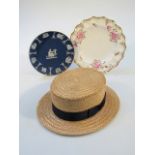 A 20thC straw boater, by Ridgemont, a Wedgwood blue Jasperware plate, 20cm dia. raised with muses