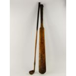 A 19thC cricket bat, and a hickory shafted golf club, (2).