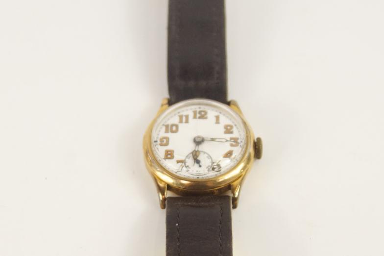 An early 20thC 9ct gold cased Vertex wristwatch, with white enamel dial and luminous Arabic