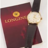 A gentleman's Longines wristwatch, in gold case, with Arabic numerals to the Champagne dial, with