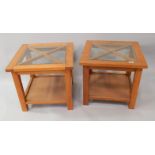 A pair of Indonesian light hardwood square lamp tables, with plate glass tops on square supports,