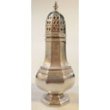 An Elizabeth II silver sugar caster, by Broadway & Co. the bellied octagonal body with a removable