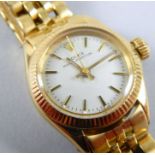 An 18ct gold Rolex Oyster Perpetual, with cream dial and later five bar strap. serial no. 3703713.