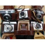 Various cameras, to include Halina 35X in fitted case, 9.5cm high, Ilford, various others, etc. (a