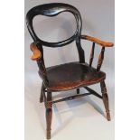 A 19thC stained ash and elm country chair, with an oval balloon back and shaped arms on ring turn