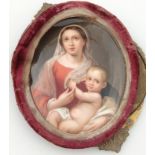 A late 19thC porcelain plaque, of The Virgin and Child, polychrome decorated in an oval outline,