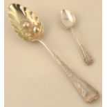 A George III silver tablespoon, Old English pattern with later repoussé and bright cut