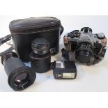 A Canon AE-1 programme camera, with Canon lens and other accessories. (a quantity)