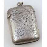 A late Victorian silver vesta case, probably Joseph Gloster, the oblong body part engine turned with