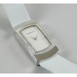 An 18ct white gold modern Tiffany & Co ladies wristwatch, with diamond encrusted surround, and