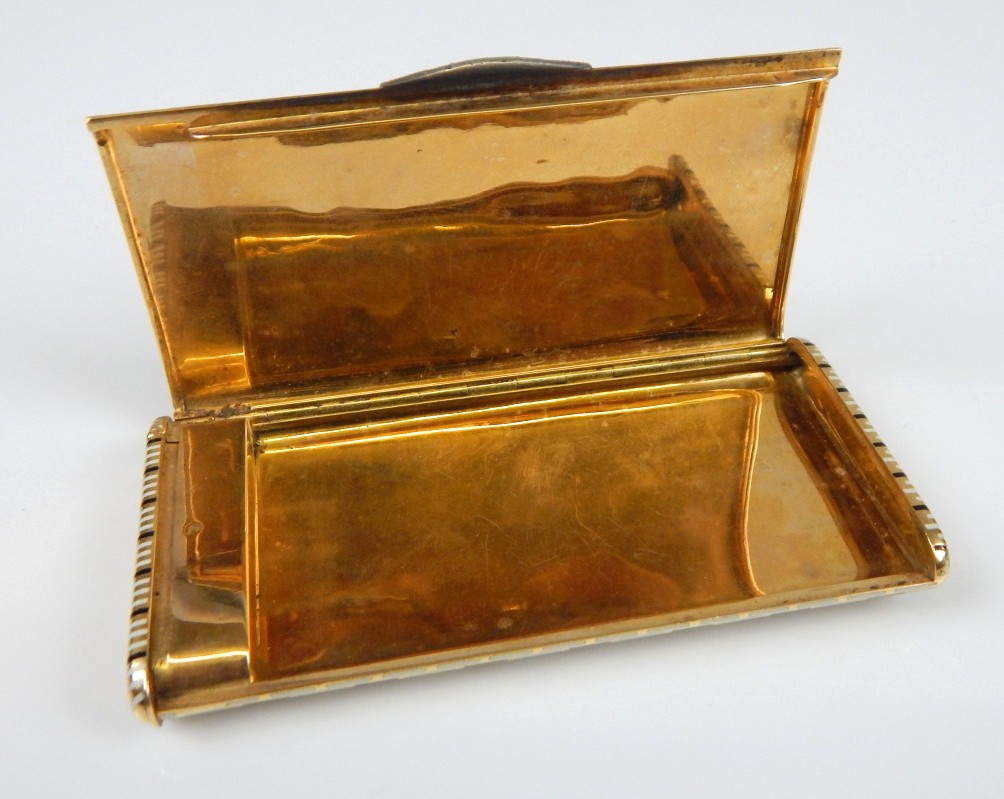 A French Art Deco yellow metal combined cigarette and vesta case, with geometric design in white and - Image 2 of 3