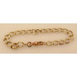A yellow metal heavy link bracelet, the clasp indistinctly marked, yellow metal, testing to 9ct,