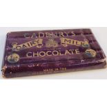 A vintage bar of Cadbury's Dairy Milk chocolate, in a purple wrapper with white stenciling, 0.5lb