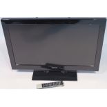 A Toshiba 32" colour flat screen TV, with black trim.