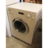A Miele Honeycomb W5780 washing machine, in white, 85cm high, 60cm wide, 58cm deep.