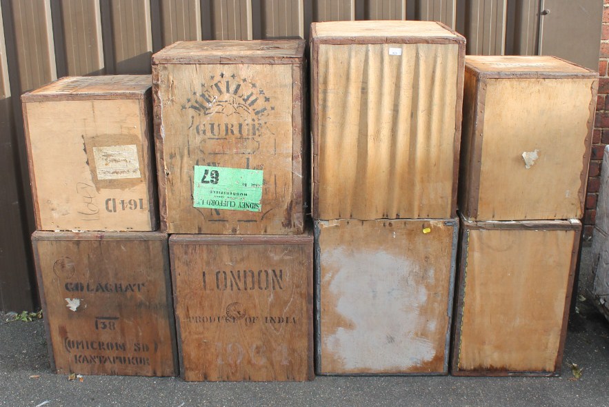 Various early 20thC tea chests, to include some stamped London Product of India, etc, metal frames