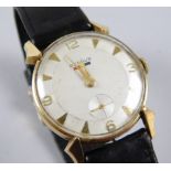 A Benrus gentleman's wristwatch, with cream dial and black leather strap, yellow metal, marked
