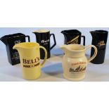 Various Wade and pub advertising jugs, to include Bell's whisky, 16cm high, Long John whisky, Corona