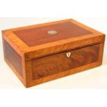 A 20thC mahogany and satinwood jewellery casket, the rectangular lid centred with a mother of