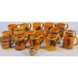 Various Wade and Wade Heath yellow glaze tankards, to include Rob Roy, 10cm high, various plain