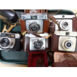 Various cameras, to include Halina with Anastigmat 1:2.8 lens in fitted case, 10cm high, Ilford