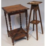 A 1920's oak occasional table, with a pie crust edge on barleytwist columns joined by an