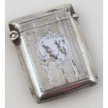 A late Victorian silver vesta case, probably Joseph Whitten with engine turn body and vacant