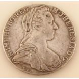 An 18thC Maria Theresa silver thaler coin, dated 1780, 4.5cm dia. fine with good definition to the