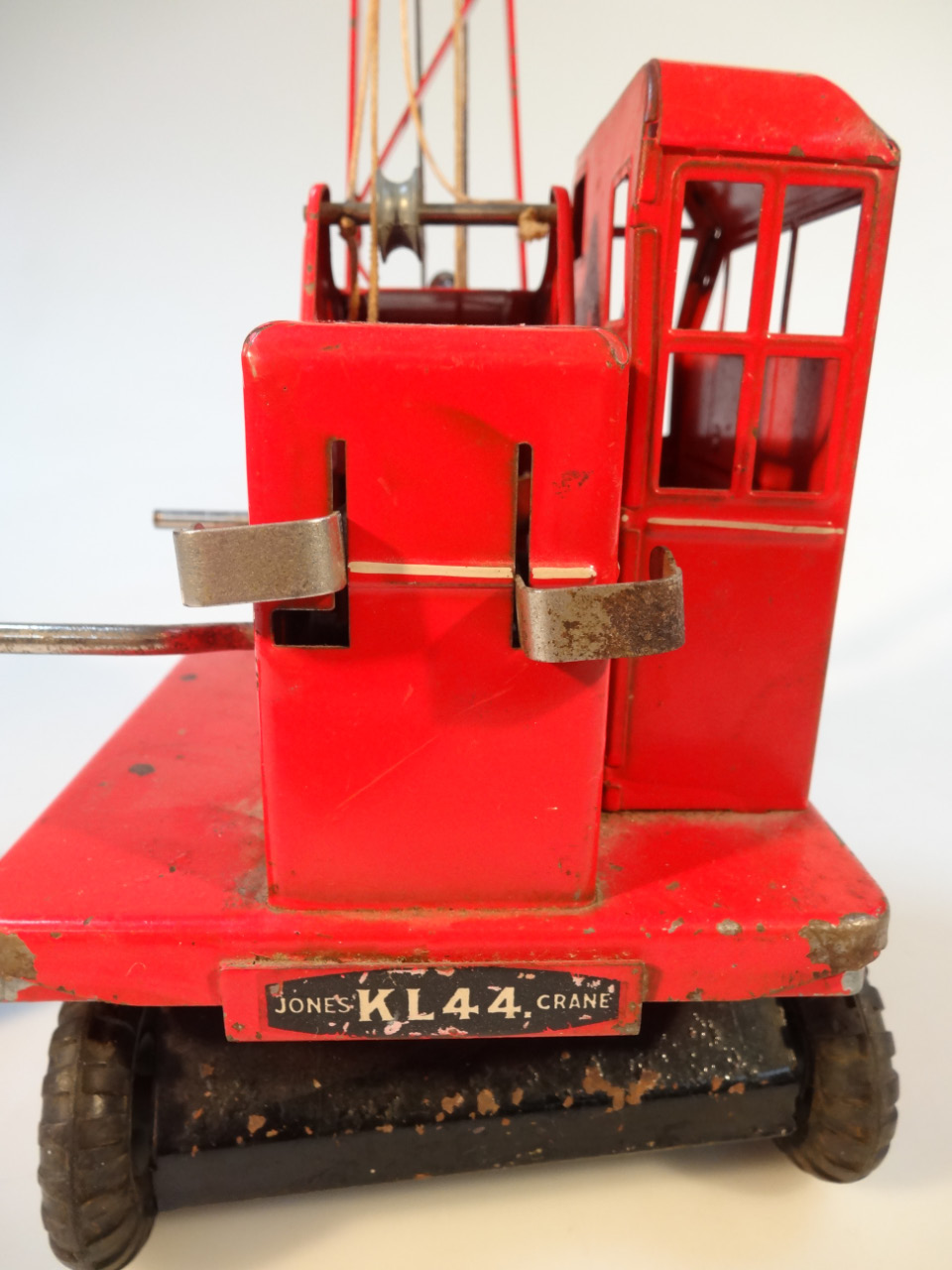 A 1950's LA Ross tin plated crane, stamped Jones K L 44, in red with an articulated base and - Image 3 of 3