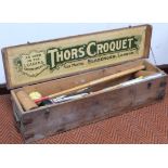 An early 20thC Thors' Slazenger croquet set, comprising mallets, coloured balls, target stick and