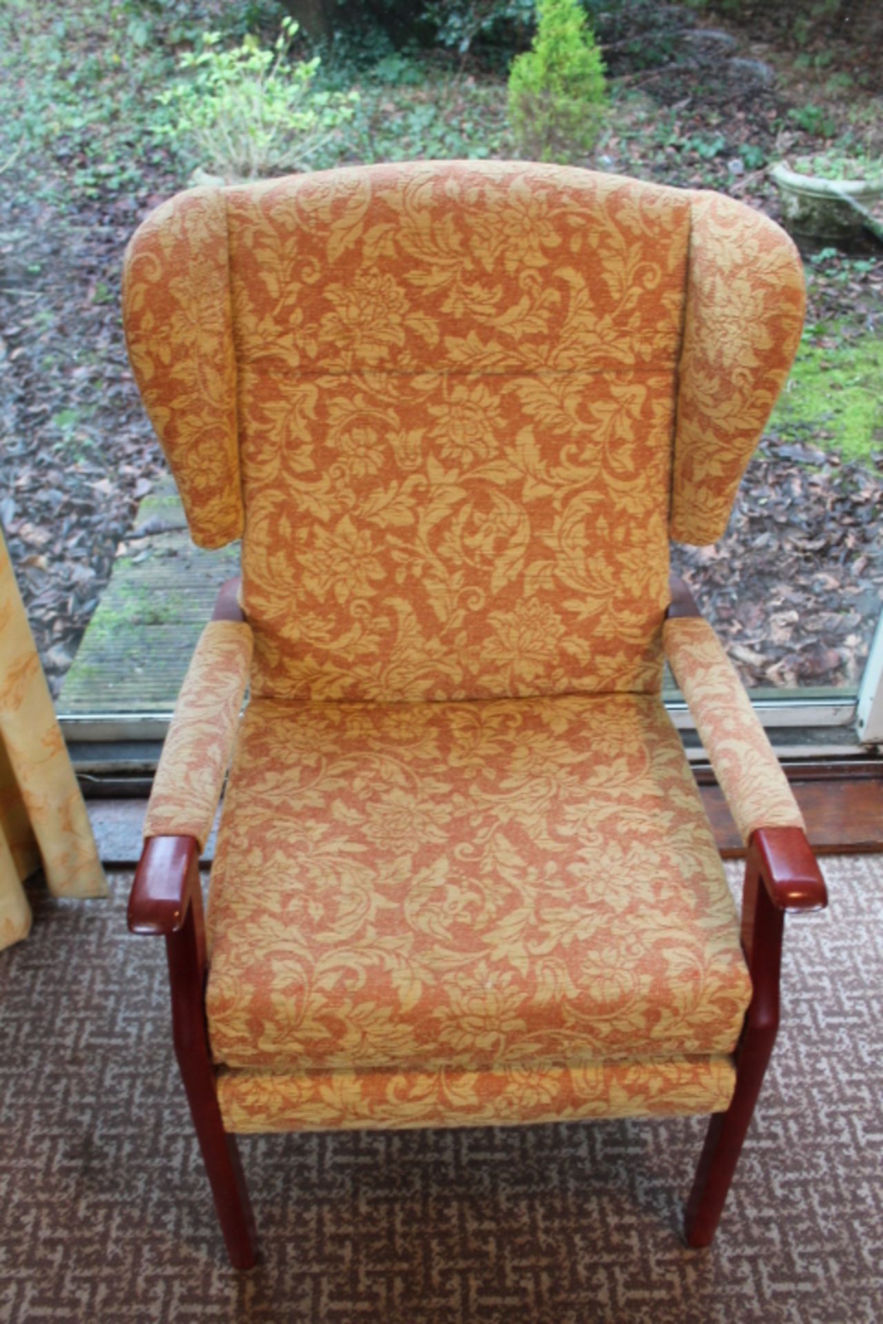 Four Upholstered Wingback Chairs