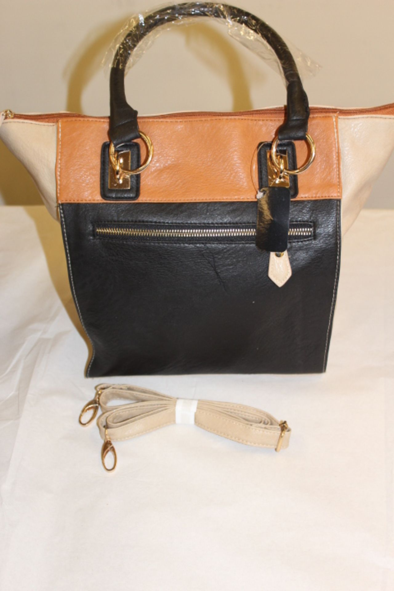 V Thomas Calvi Black & Tan Handbag