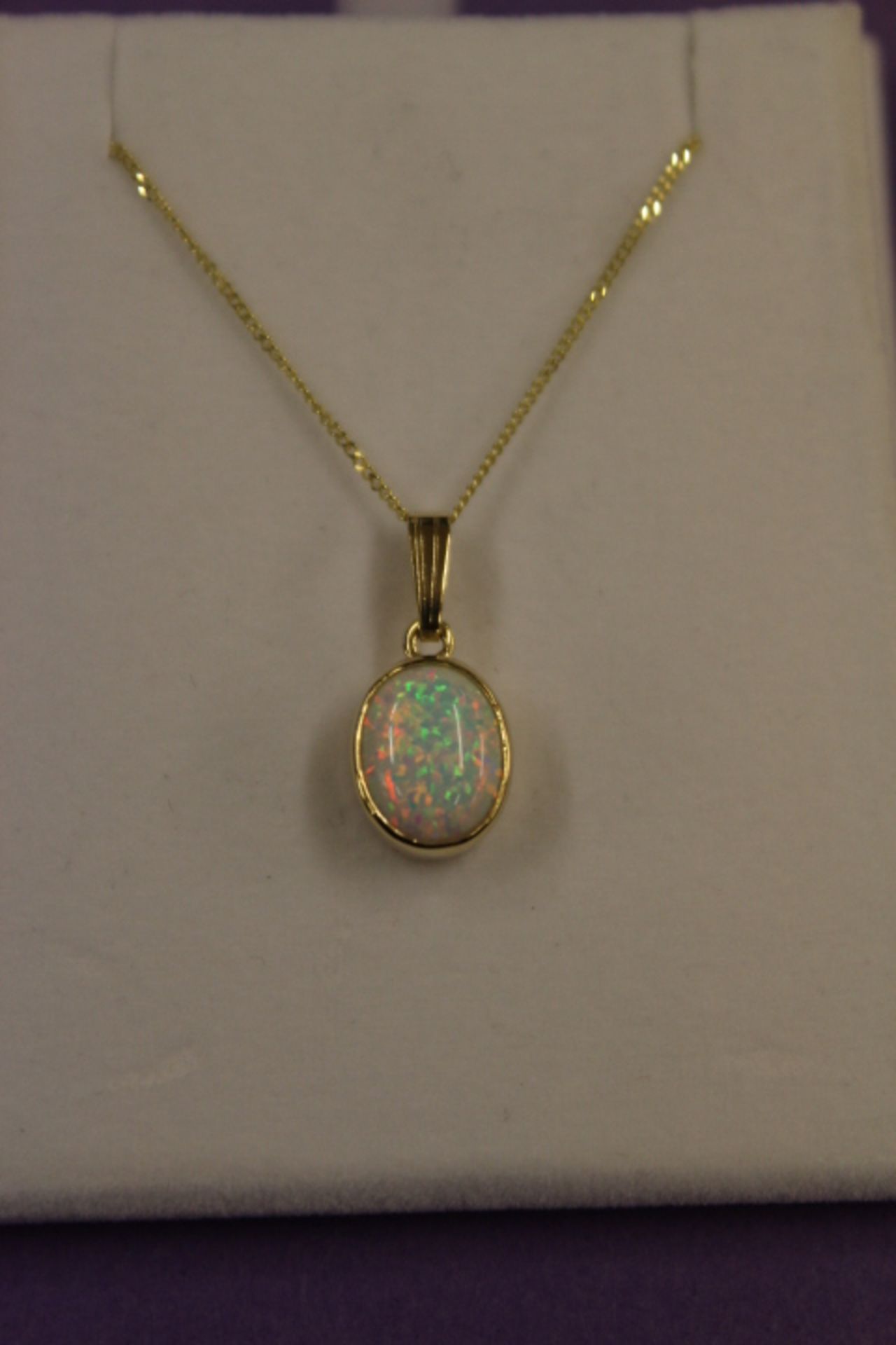 Gold Opal Pendant On Gold Chain