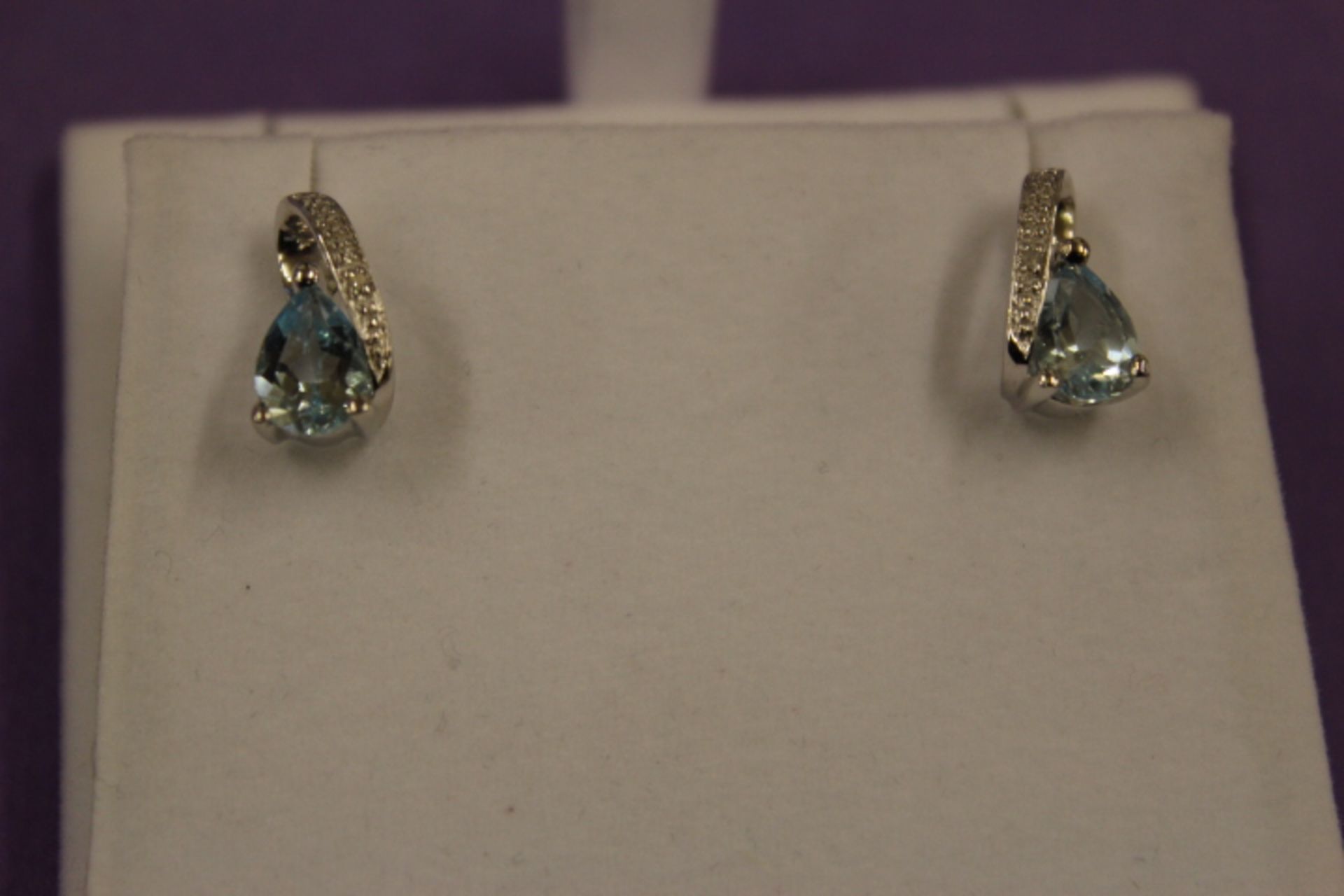 Pair WM (925) Blue Topaz & Diamond Earrings