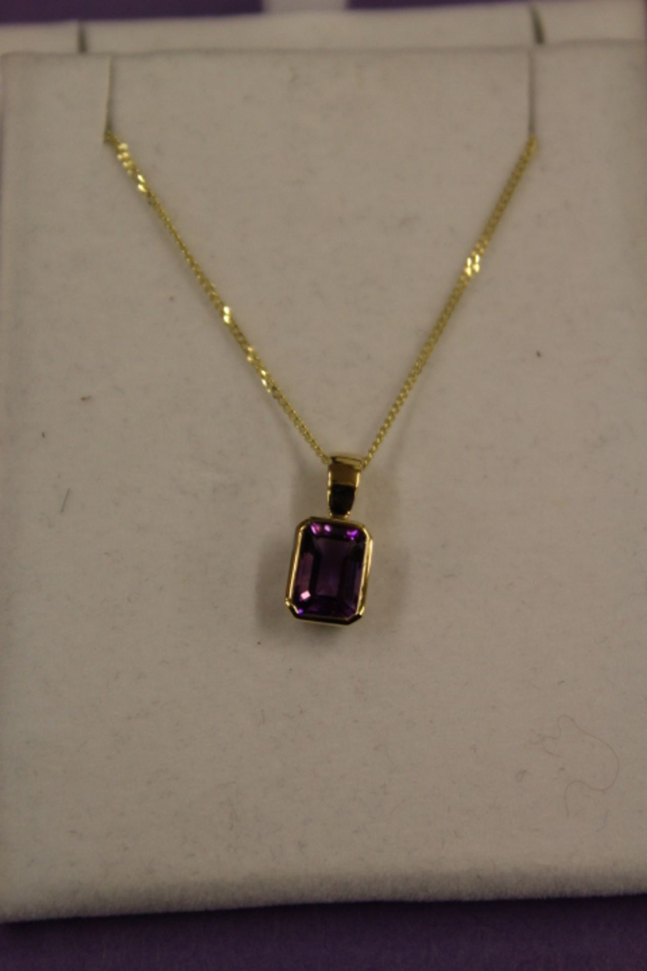 Gold Amethyst Pendant On Gold Chain
