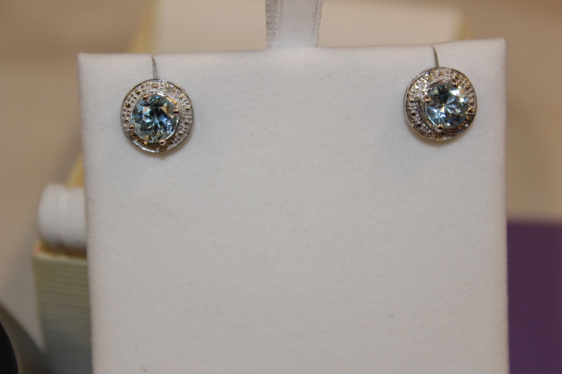 Pair WM (925) Blue Topaz & Diamond Round Earrings