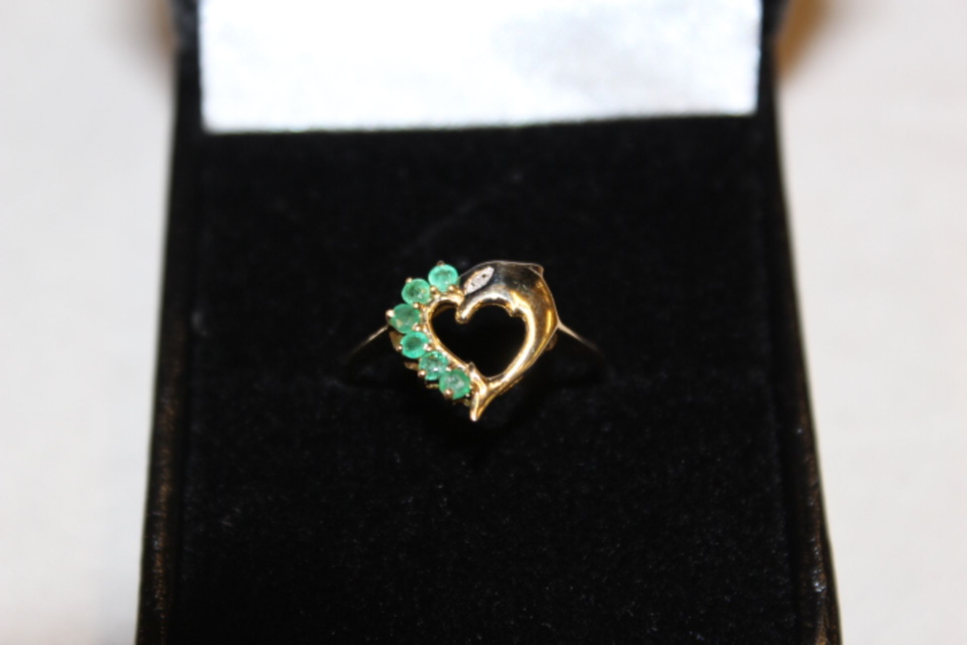 Ladies 9ct Gold Ring Set with Six Emeralds and Half Dolphin Design