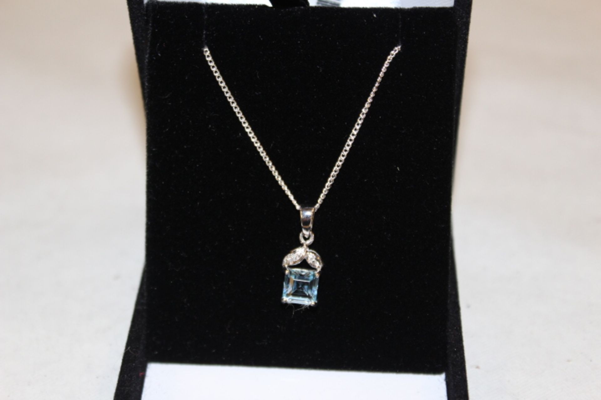 WM (925) Blue Topaz & Diamond Pendant On Silver Chain