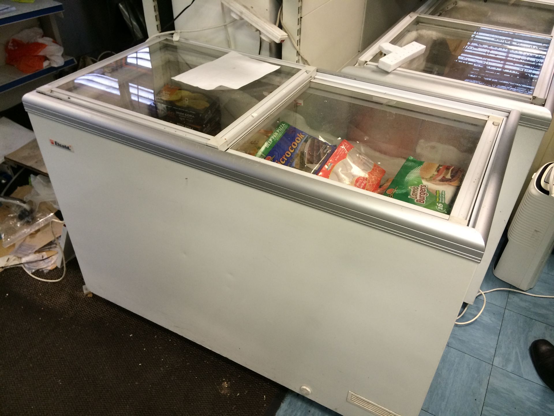 Elcold Shop Freezer With Sliding Top Approx 5 x 2 feet Containing About 50 Packs Of Frozen Food