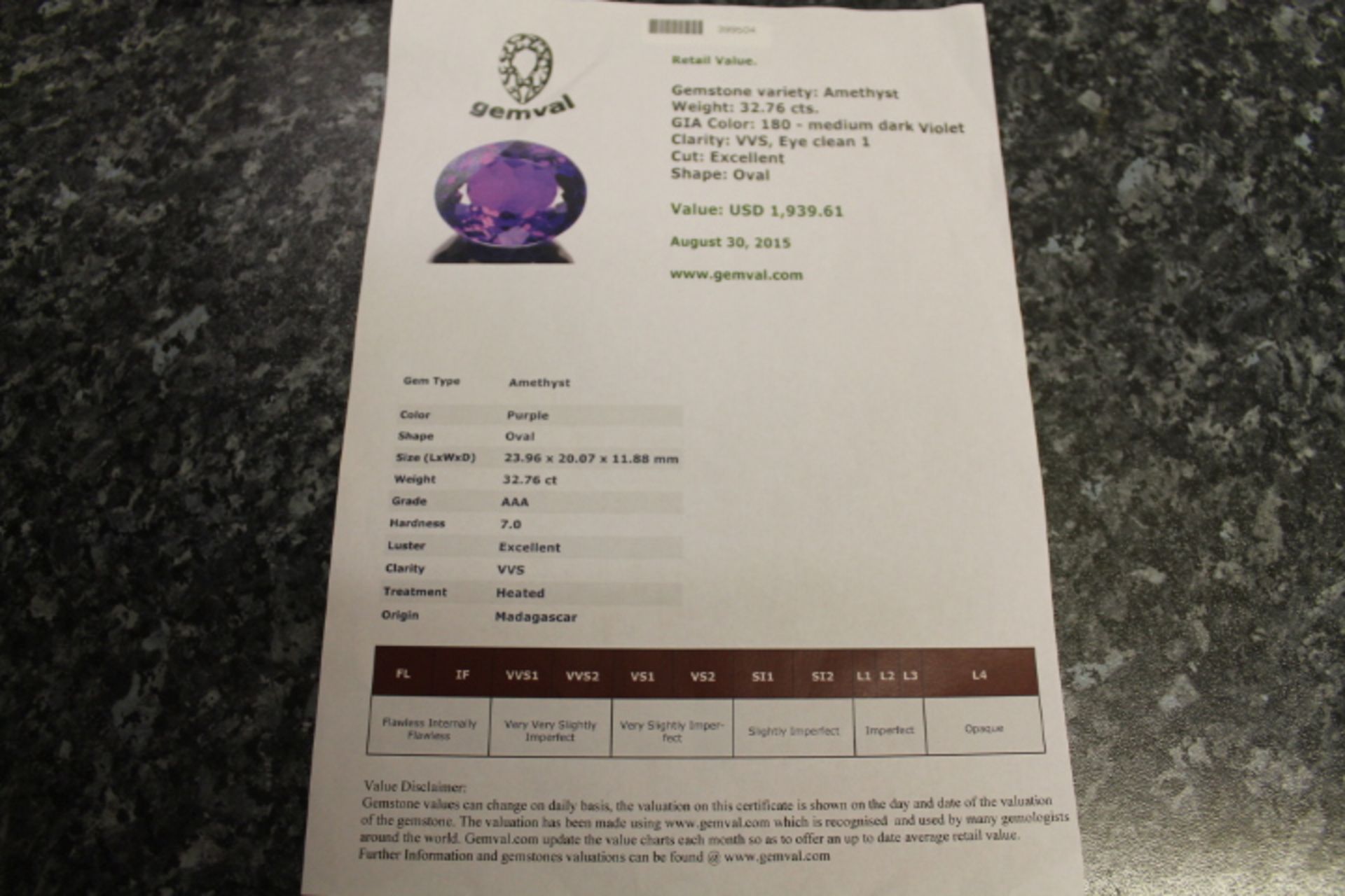 Amethyst 32.76ct Gem With Valuation Certificate - Gem Valued At $1931.61 (Approx £1265.53) - Image 2 of 2