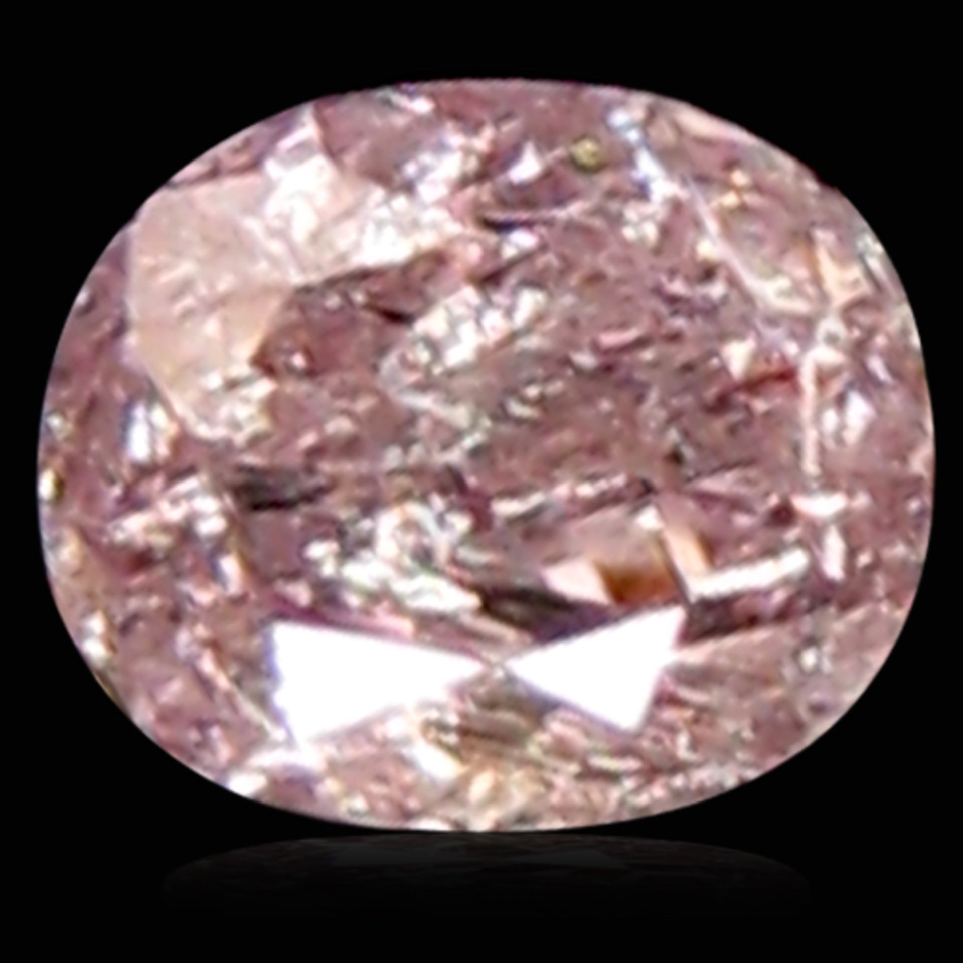 0.08ct Oval Cut Fancy Pink Diamond - Comes With Valuation Certificate - Gem Valued At $192.00 (
