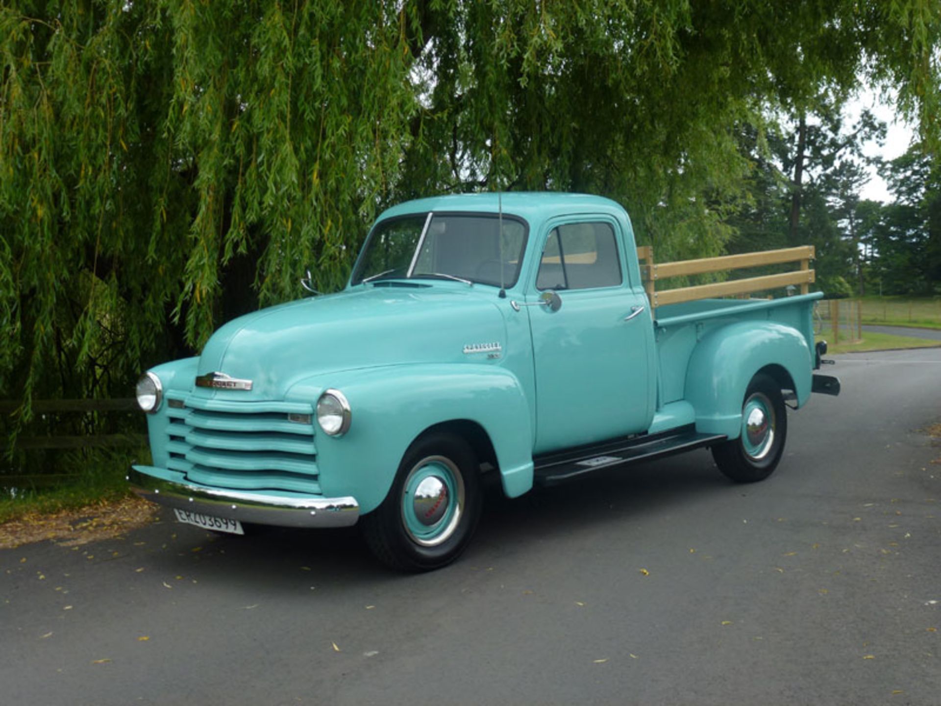 - Finished in a notably eye-catching pale pastel shade of Turquoise 

- Pickup bed features wooden