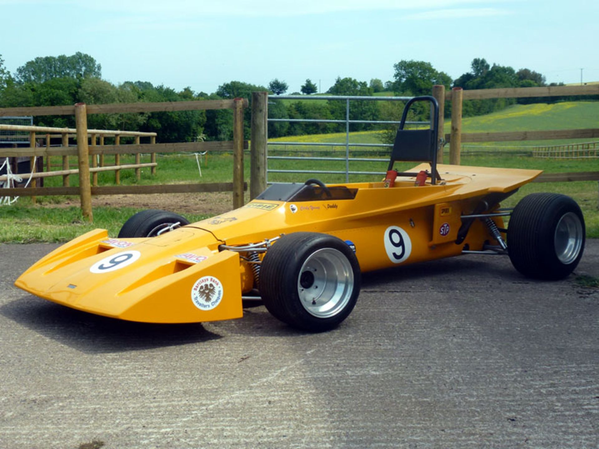 - Two-thirds scale single-seater with steel monocoque tub and GRP bodywork - Yamaha 125cc engine