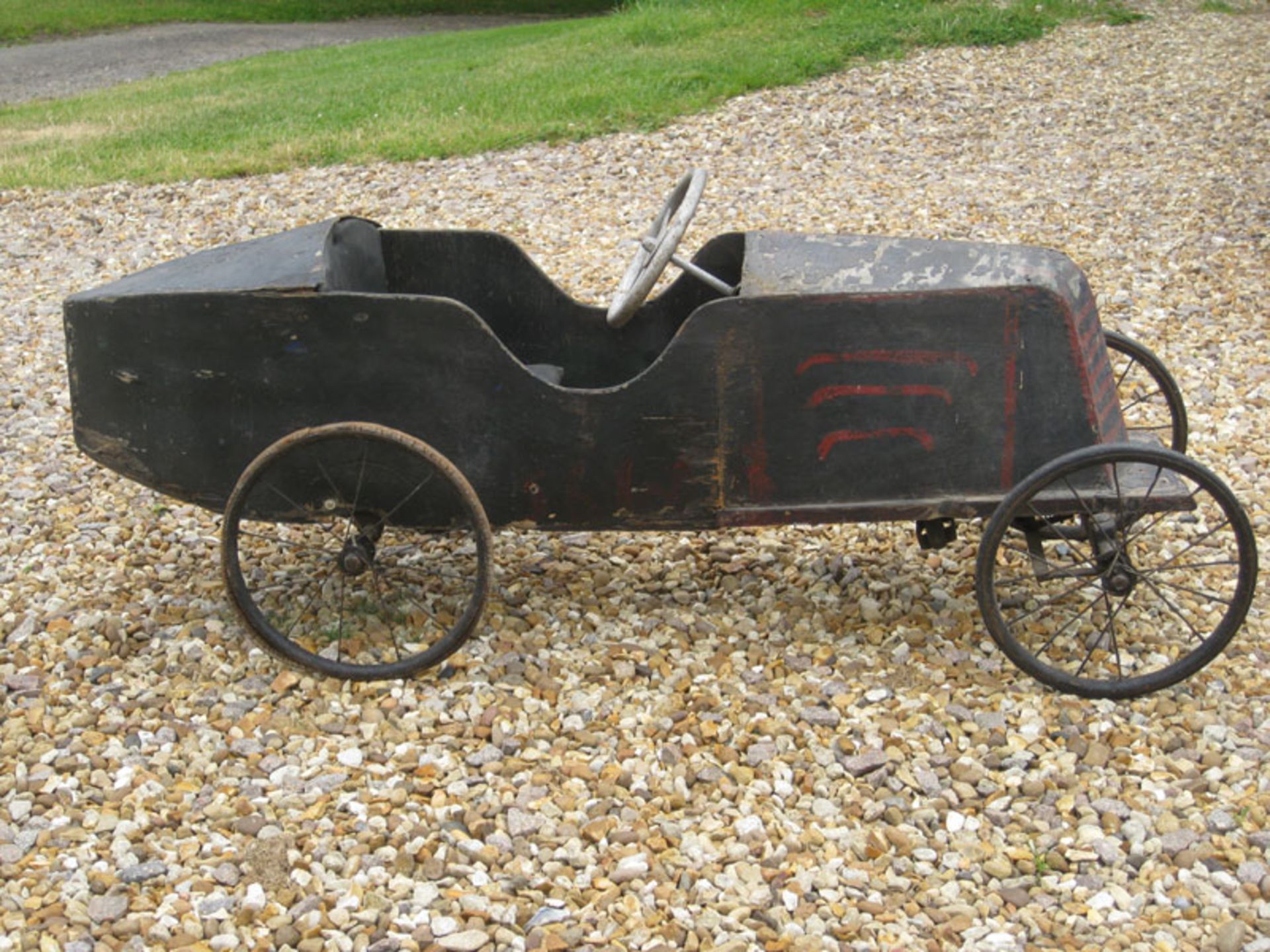 A rare early 20thC childs' pedal-car c1920; of painted plywood panels on wood & metal frame - Image 3 of 5